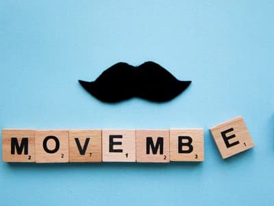Moustache with Movember written beneath