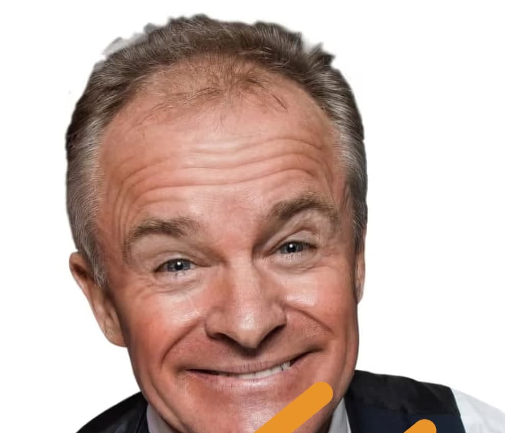 Bobby Davro, comedian, smiling to camera