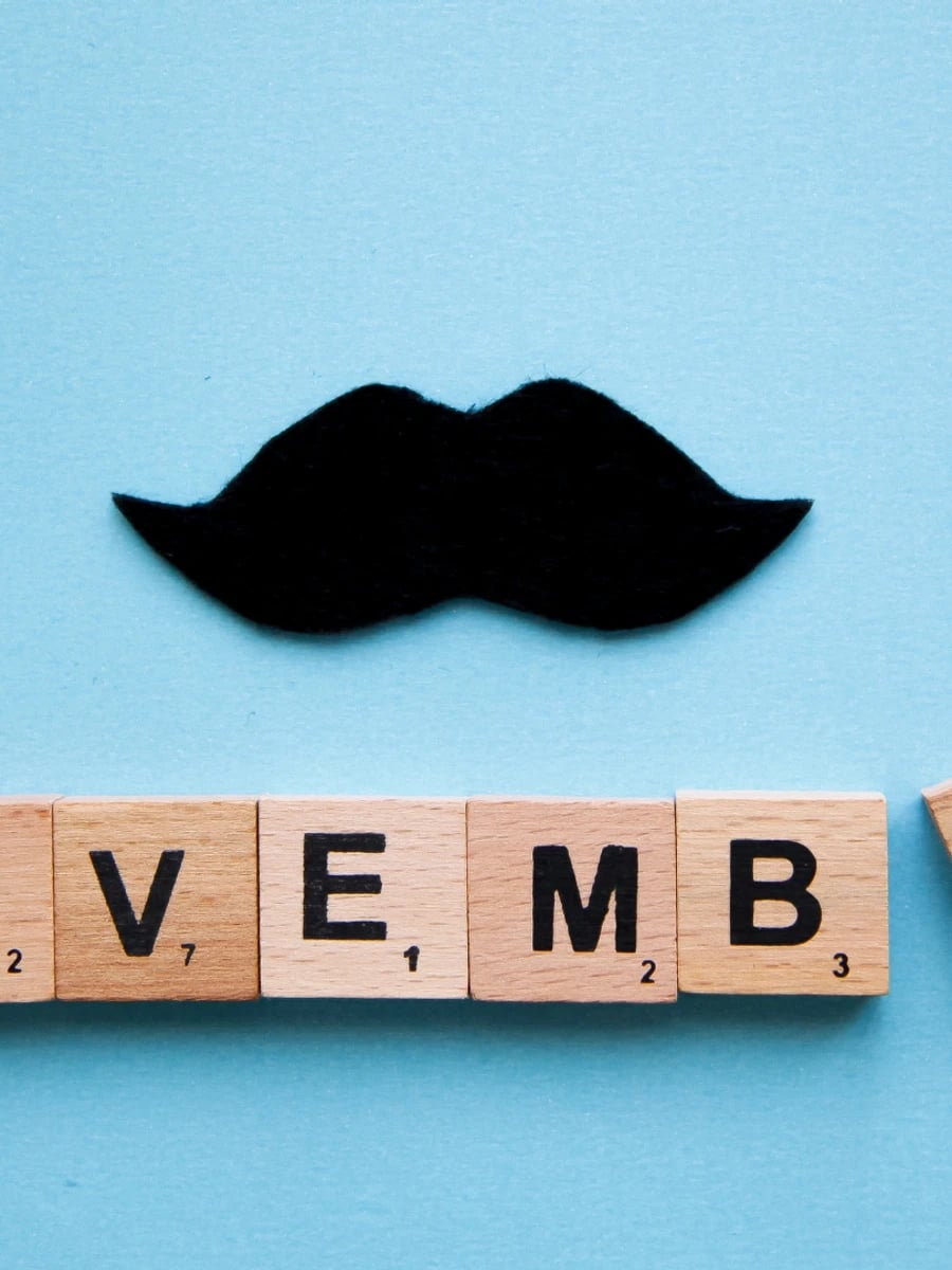 Moustache with Movember written beneath